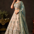 Luxurious Beige Fendy Silk Designer Lehenga Choli with Heavy Gold Embroidery and Dupatta