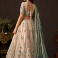 Luxurious Beige Fendy Silk Designer Lehenga Choli with Heavy Gold Embroidery and Dupatta