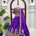 Glorious Purple Vichitra Silk Designer Lehenga Choli with Embroidery Work and Matching Dupatta