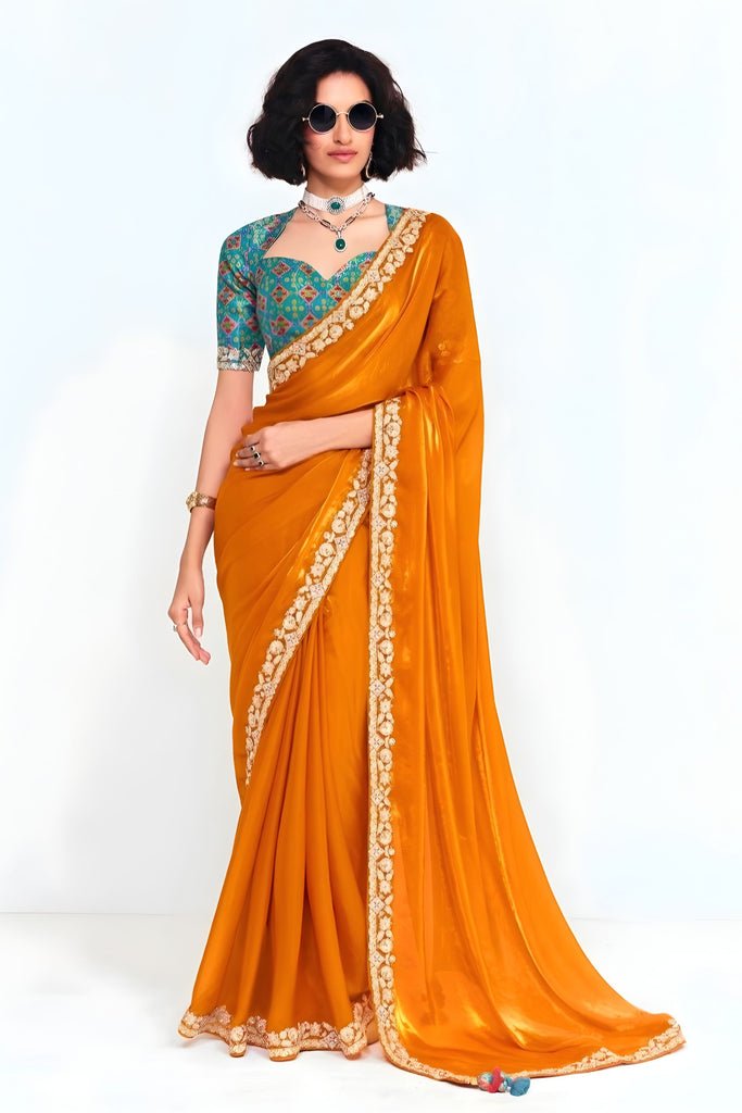Orange Georgette Saree with Gold Lace Border and Printed Blouse