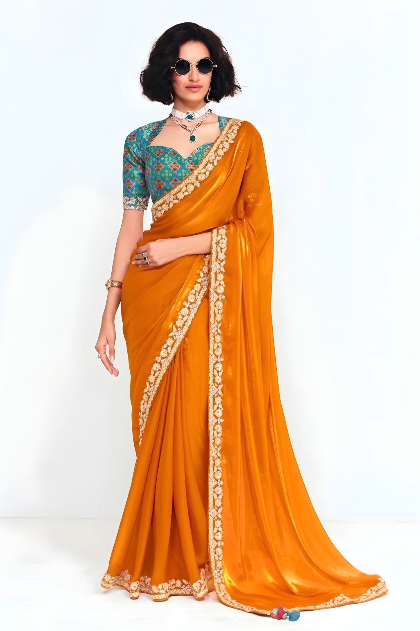 Orange Georgette Saree with Gold Lace Border and Printed Blouse