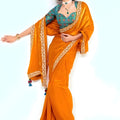 Orange Georgette Saree with Gold Lace Border and Printed Blouse