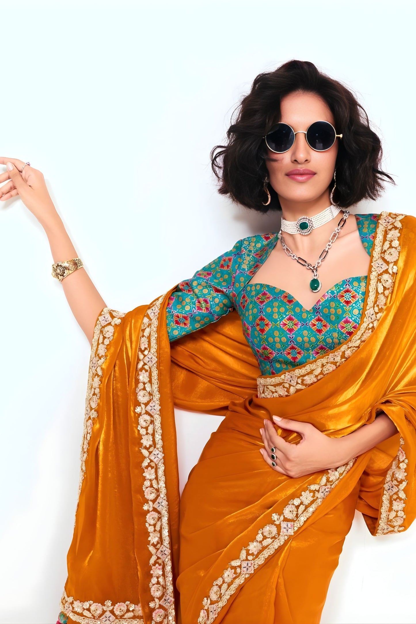 Orange Georgette Saree with Gold Lace Border and Printed Blouse