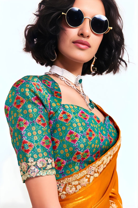 Orange Georgette Saree with Gold Lace Border and Printed Blouse