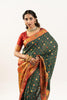 Designer Bottle Green Patola Silk Saree with Rich Red Contrast Blouse