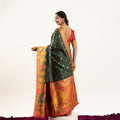 Designer Bottle Green Patola Silk Saree with Rich Red Contrast Blouse