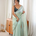 Elegant Pastel Green Fendy Satin Woven Saree with Beads Work for Women