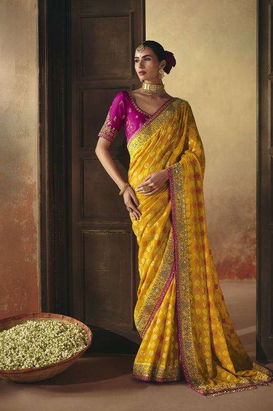 Radiant Yellow Pure Georgette Saree Weaving Work and Embroidered Border for Women