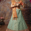 Elegant Mint Green Brocade Silk Designer Lehenga Choli with Gold Zari Weaving Work