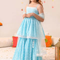 Young girl in graceful sky blue printed palazzo suit with dupatta