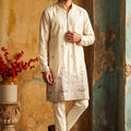 Charming Cream Silk Embroidered Kurta Pyjama Set for Men with Heavy Floral Border Work