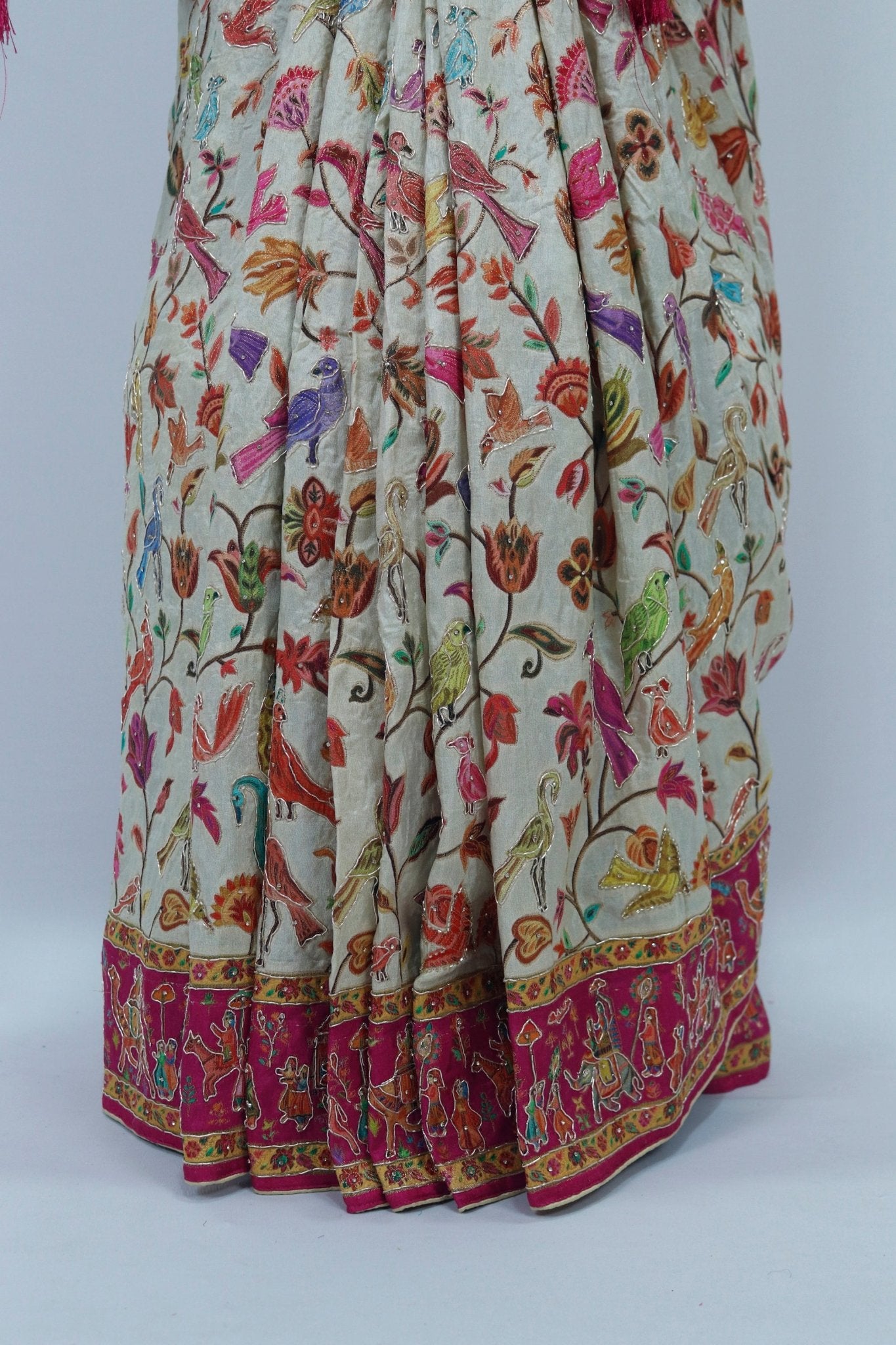 Cream Banarasi Silk SareeVibrant Rajasthani Wedding Scene Pallu - Mangaldeep NX