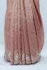 Dusty Rose Pink Banarasi Silk Saree with Heavy Embroidered Border and Tassels – Wedding & Festive Wear - Mangaldeep NX