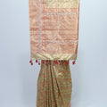 Elegant Light Green and Peach Banarasi Silk Saree with Floral Zari Weaving and Tassel Detailing Wedding Festive Wear - Mangaldeep NX
