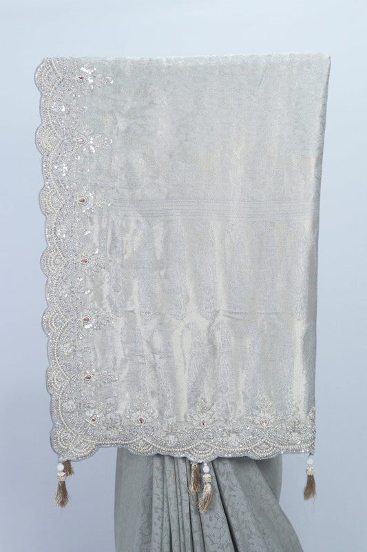 Elegant Silver Grey Banarasi Saree with Heavy Embroidered Border and Tassel Detailing - Mangaldeep NX