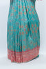 Graceful Green and Coral Bandhani Silk Saree with Mirror Work and Tassel Accents - Mangaldeep NX