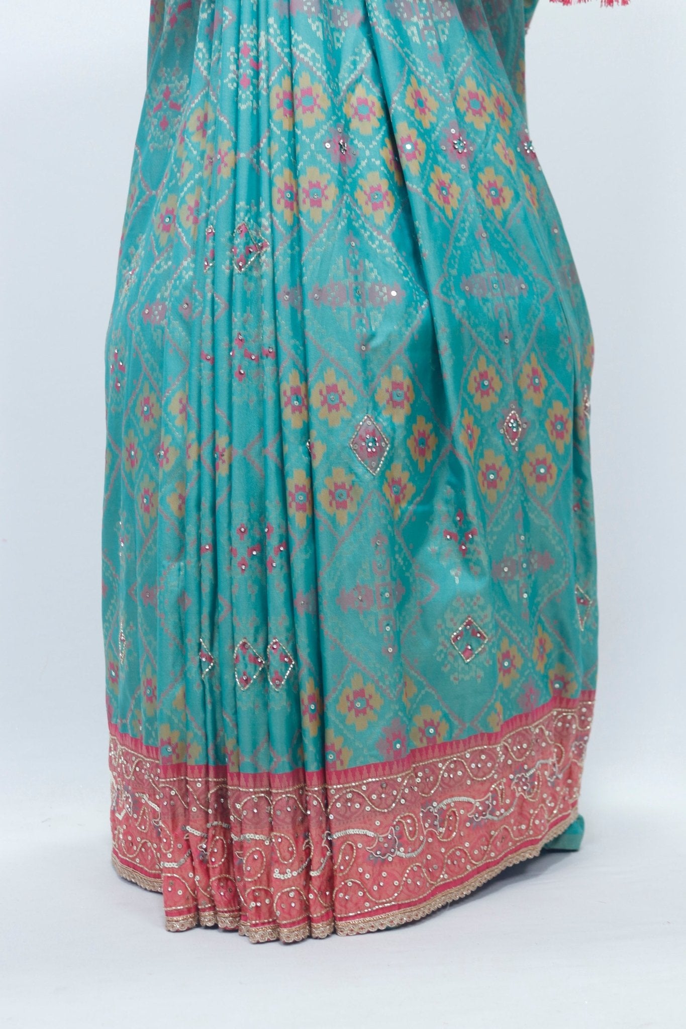 Graceful Green and Coral Bandhani Silk Saree with Mirror Work and Tassel Accents - Mangaldeep NX