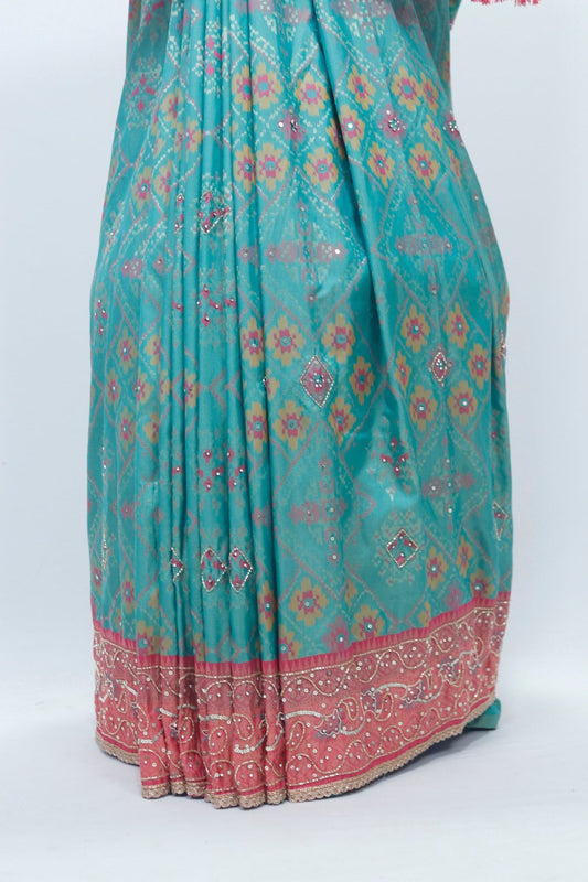 Graceful Green and Coral Bandhani Silk Saree with Mirror Work and Tassel Accents - Mangaldeep NX