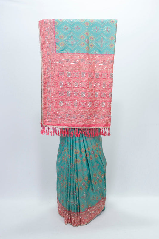 Graceful Green and Coral Bandhani Silk Saree with Mirror Work and Tassel Accents - Mangaldeep NX