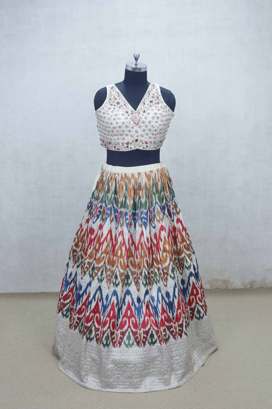 Ivory Mirror Work Embroidered Blouse with Multicolor Ikat Print Lehenga and Silk Dupatta - Mangaldeep NX