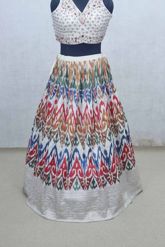 Ivory Mirror Work Embroidered Blouse with Multicolor Ikat Print Lehenga and Silk Dupatta - Mangaldeep NX