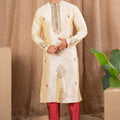 Men's Cream Art Silk Kurta Pyjama Set with All - Over Embroidery and Contrast Red Bottoms - Mangaldeep NX