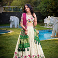 Off - White Lotus Motif Embroidered Lehenga Choli Set with Green and Pink Contrast Dupatta - Mangaldeep NX