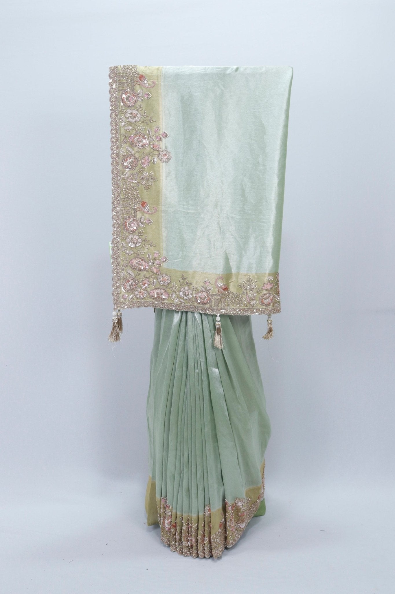 Pastel Green Organza Saree with Heavy Embroidered Border and Tassels - Mangaldeep NX