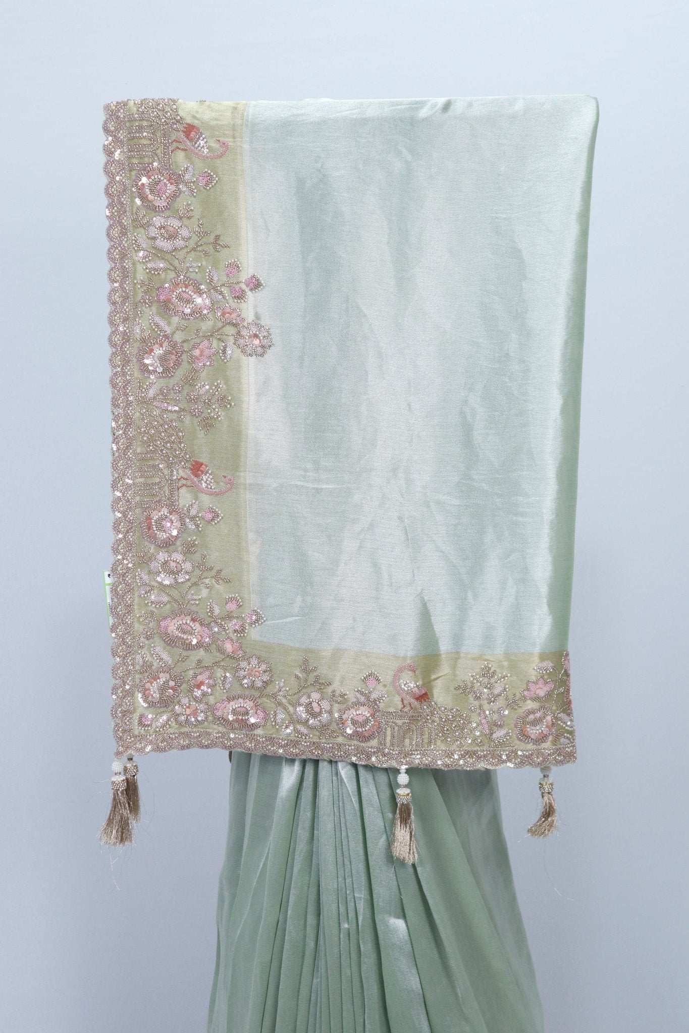 Pastel Green Organza Saree with Heavy Embroidered Border and Tassels - Mangaldeep NX