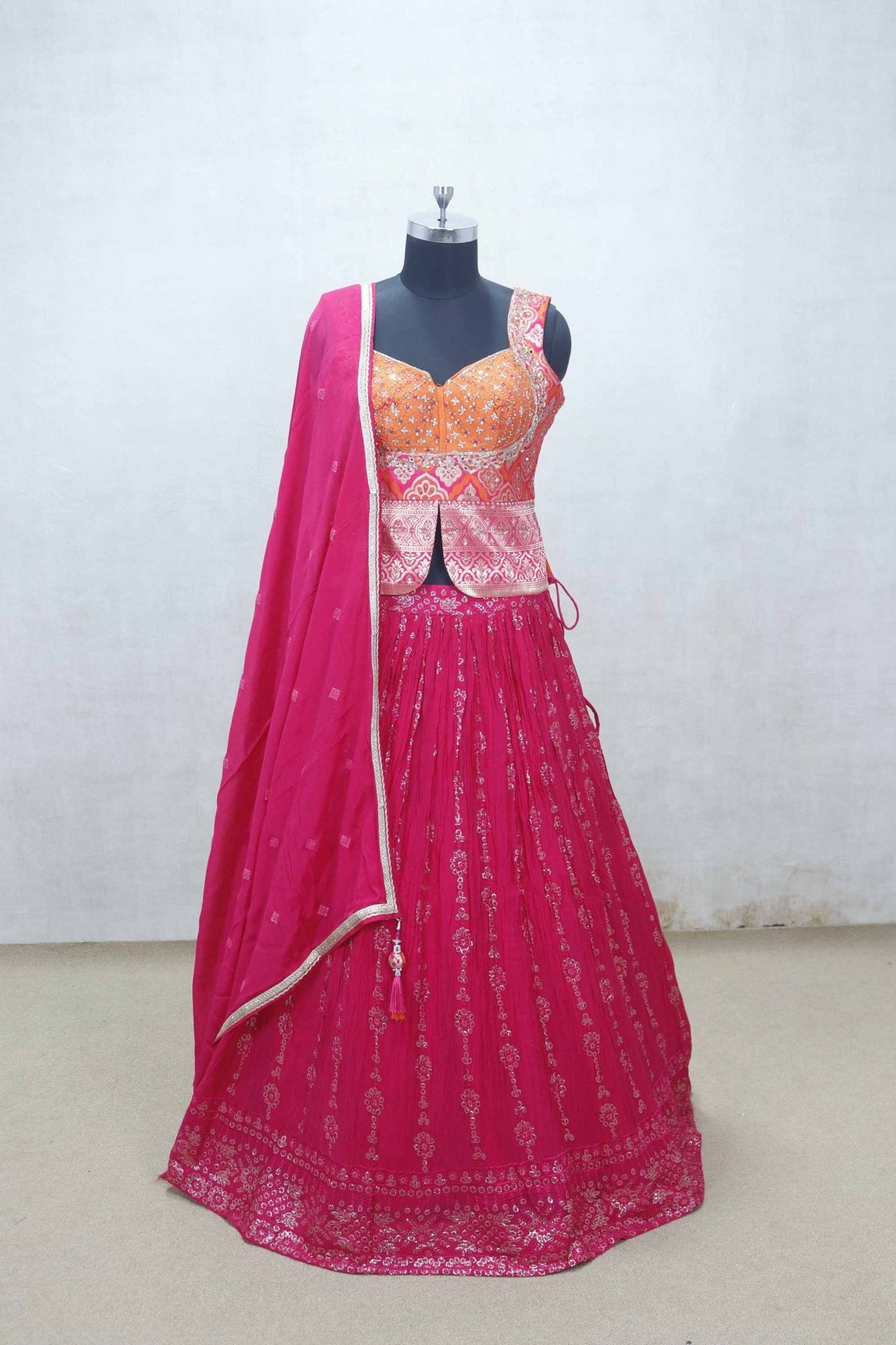 Rani Pink Embroidered Lehenga Choli with Orange Mirror Work Blouse and Printed Jacket Style Detail - Mangaldeep NX
