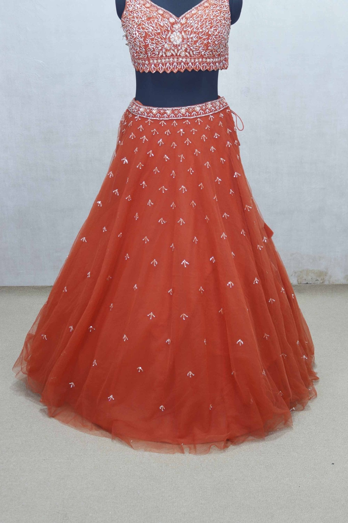 Rust Orange Net Embroidered Lehenga Choli with Sequin Work and Sheer Dupatta - Mangaldeep NX