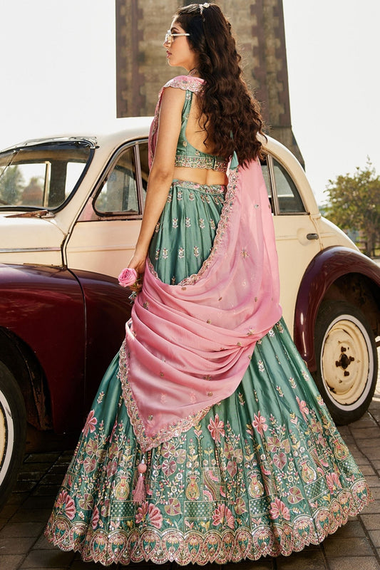 Teal Green Embroidered Silk Lehenga Choli with Floral Motifs and Pink Net Dupatta - Mangaldeep NX