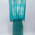 Turquoise Blue Banarasi Silk Saree with Golden Zari Floral Weaving & Tassel Pallu – Traditional Wedding & Festive Wear - Mangaldeep NX