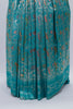 Turquoise Blue Banarasi Silk Saree with Golden Zari Floral Weaving & Tassel Pallu – Traditional Wedding & Festive Wear - Mangaldeep NX