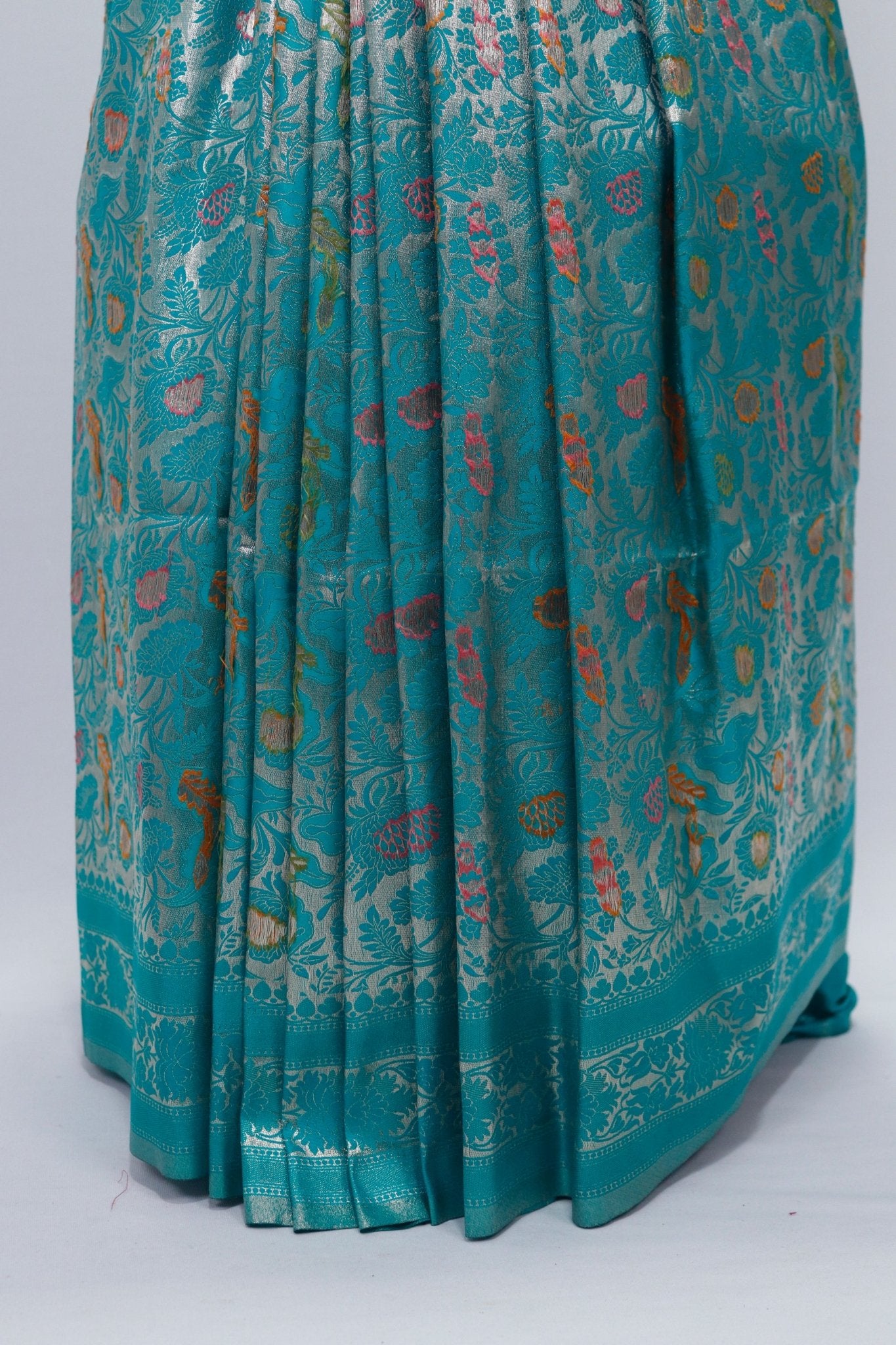 Turquoise Blue Banarasi Silk Saree with Golden Zari Floral Weaving & Tassel Pallu – Traditional Wedding & Festive Wear - Mangaldeep NX