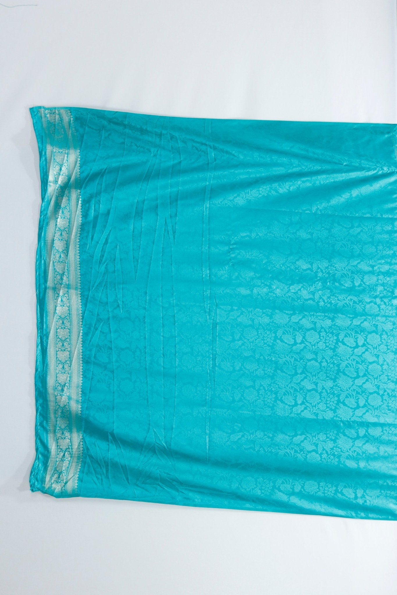 Turquoise Blue Banarasi Silk Saree with Golden Zari Floral Weaving & Tassel Pallu – Traditional Wedding & Festive Wear - Mangaldeep NX