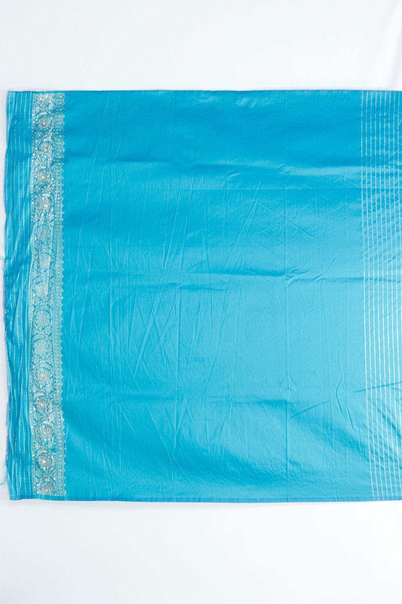 Vibrant Pink and Turquoise Bandhani Silk Saree with Intricate Gold Zari Work and Tassel Detailing - Mangaldeep NX