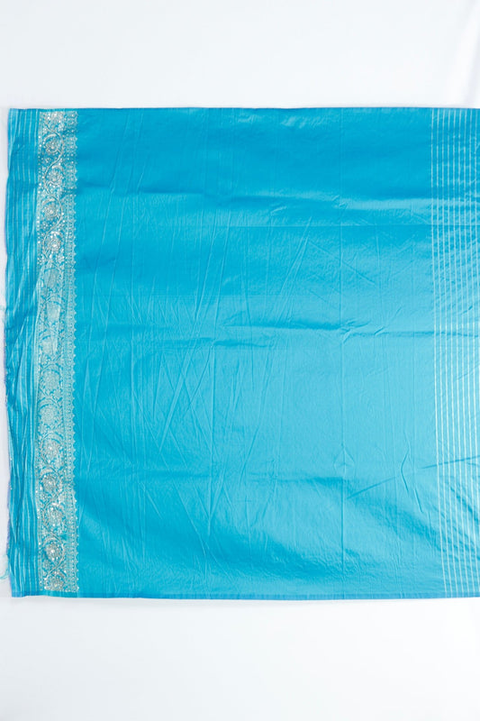 Vibrant Pink and Turquoise Bandhani Silk Saree with Intricate Gold Zari Work and Tassel Detailing - Mangaldeep NX