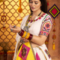 White Traditional Garba Lehenga Choli Set with Pink Patch Embroidery for Navratri - Mangaldeep NX