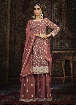 Attractive Embroidered Rust Faux Georgette Salwar Kameez