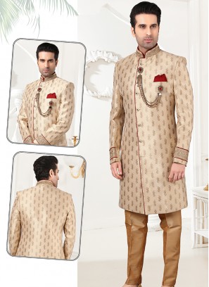 Attractive Gold Jaquard Sherwani Set with Chikoo Trouser