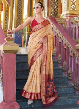 Mesmeric Cream Patola Print Classic Saree