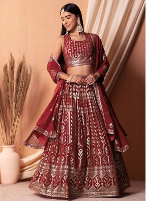 Paramount Maroon Mehndi Trendy Lehenga Choli