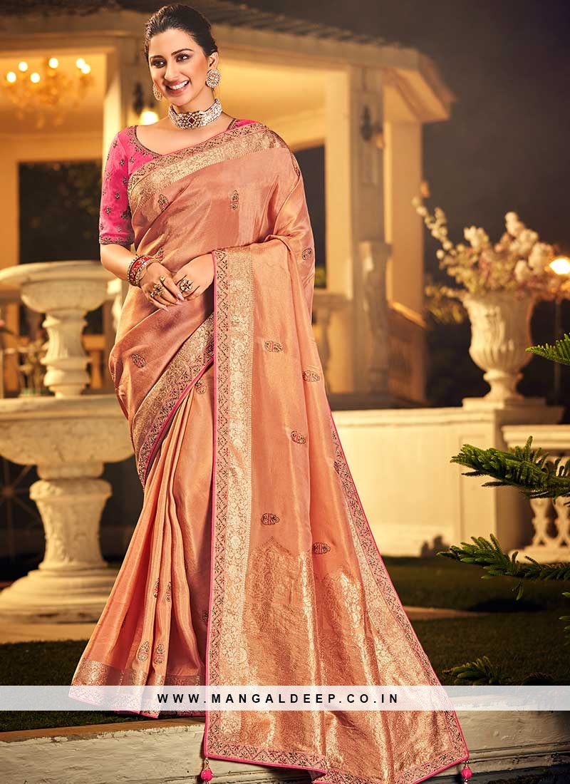 https://www.mangaldeep.co.in/image/cache/data/peach-color-dola-silk-wedding-wear-saree-40253-800x1100.jpg