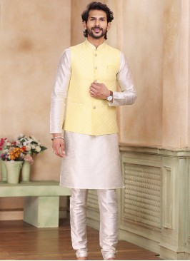 Yellow Jacquard Banarasi Silk 3-Piece Jacket Set with cream Churidar Bottom.