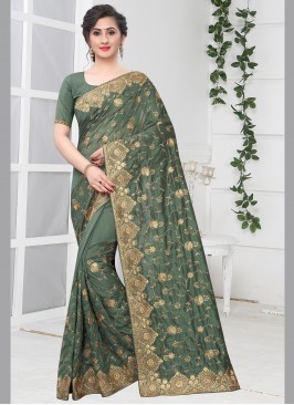 Snazzy Zari Green Silk Traditional Saree