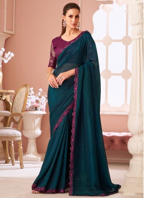 Staring Border Georgette Morpeach  and Teal Classic Saree