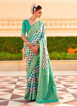 Titillating Foil Print Silk Turquoise Saree